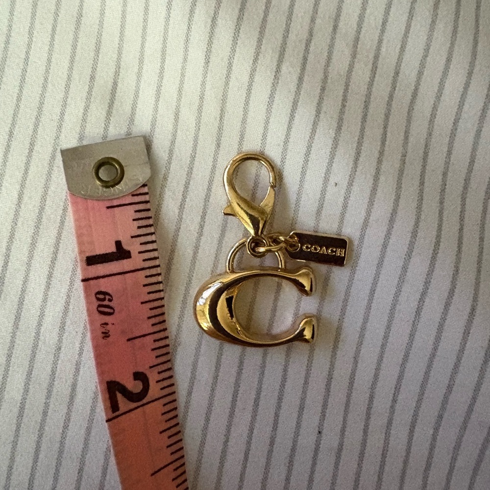 Coach Gold 'C' Keychain Accessory